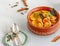 Curried Shrimp, Traditional Indian Shrimp Curry Horizontal Directly Above Flat Lay White Background Photo