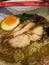 Curry Ramen with boiled egg and roasted chicken