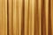 Curtain background detail with waves in warm tone