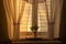 Curtain interior sunset. House room. run lighting through transparent curtain on window into bedroom at evening sunny day