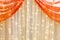 Curtain and orange lights as decoration