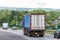 Curtain side lorry truck on uk motorway in fast motion