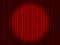 Curtain on stage. Red background with spotlight in theater or cinema. Red closed velvet curtain for circus, theatre, scene, club.