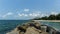 The curve of the coast, Big rock as Dam to protect wave in Thailand