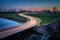 Curve light trails on country road in the landscape of the province of Groningen, The Netherlands