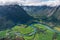 Curve of Rauma river runs through Romsdalen valley in summer season view from  Romsdalseggen trekking trail in West of Norway,