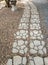 The curve walkway block along the stone file in the garden