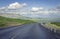 Curved asphalt road in high mountains