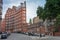 Curved building with red brick facade