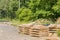 Curved concrete bricks used to support large utility poles