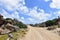 Curved Dirt Roadway Winding Through the Remote Area Aruba