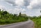 Curved and disappearing rural road Ekiti State Nigeria. Ekiti hills, disappearing road, 