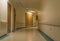 Curved hospital corridor at night