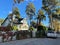 Curved modern building under high trees in Jurmala of Latvia