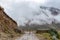 Curved mountain road in misty mountains, Abra Mariano Llamoja, pass between Yanama and Totora, The Choquequirao trek, Peru