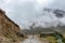 Curved mountain road in misty mountains, Abra Mariano Llamoja, pass between Yanama and Totora, The Choquequirao trek, Peru