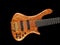 Curved patterned wood bass guitar body on black