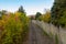 Curved Railroad Track in Duluth Minnesota with early autumn colors.