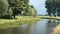 Curved river in a Dutch landscape in summertime