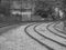 curved train tracks black and white