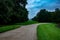 Curved walkway going through a freshly cultivated lawn in Burgerpark, Bremen, Germany