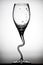 Curved wine glass with drops