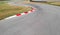 Curves on karting race track, aerial view background