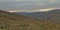 Curves of Sierra Nevada mountains and valleys on a cloudy day