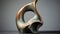 Curvilinear Bronze Sculpture On Gray Background