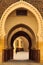 Curving arches into mosque courtyard in Fez