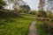 Curving hillside path with stairways in plants of sunny winter m