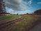 Curving railroad in the countryside on a gloomy day