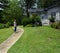 Curving Sidewalk Leads to Her Home