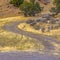 Curving trail on grassy land in Goshen Canyon Utah