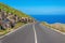 Curvy asphalt road leading to amazing sea bay