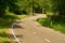 Curvy empty country road in the summer