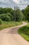 Curvy gravel countryside road in the Lithuania