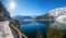 Curvy lakeside road with view to lake achensee and health resort Pertisau, austrian alps in winter
