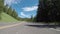 Curvy Mountain Road with Partly Cloudy Sky