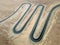 curvy road from a drone view in the desert