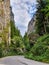 Curvy road between steep rocks of Trigrad gorge in the Western Rhodopes, Bulgaria.