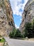 Curvy road between steep rocks of Trigrad gorge in the Western Rhodopes, Bulgaria.