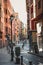 Curvy Street with Lamp Posts and Pedestrian Way