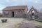 Cusco, Peru - circa June 2015: Stone Hut house and gate at the Peruvian village in the countryside, Andes Mountains, Peru