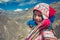 Cusco / Peru - May 29.2008: Portrait of a  boy, smiling dressed up in colorful native peruvian costume