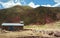 Cusco/Peru - Oct.03.19: humble house on the way to Palccoyo rainbow mountains, in the middle of Andes valley