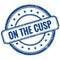 ON THE CUSP text on blue grungy round rubber stamp