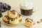 Custard pastries profiteroles. small eclairs with chocolate