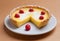 Custard tart with raspberries isolated on white plate