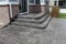 Custom concrete stamped patio with gray color added